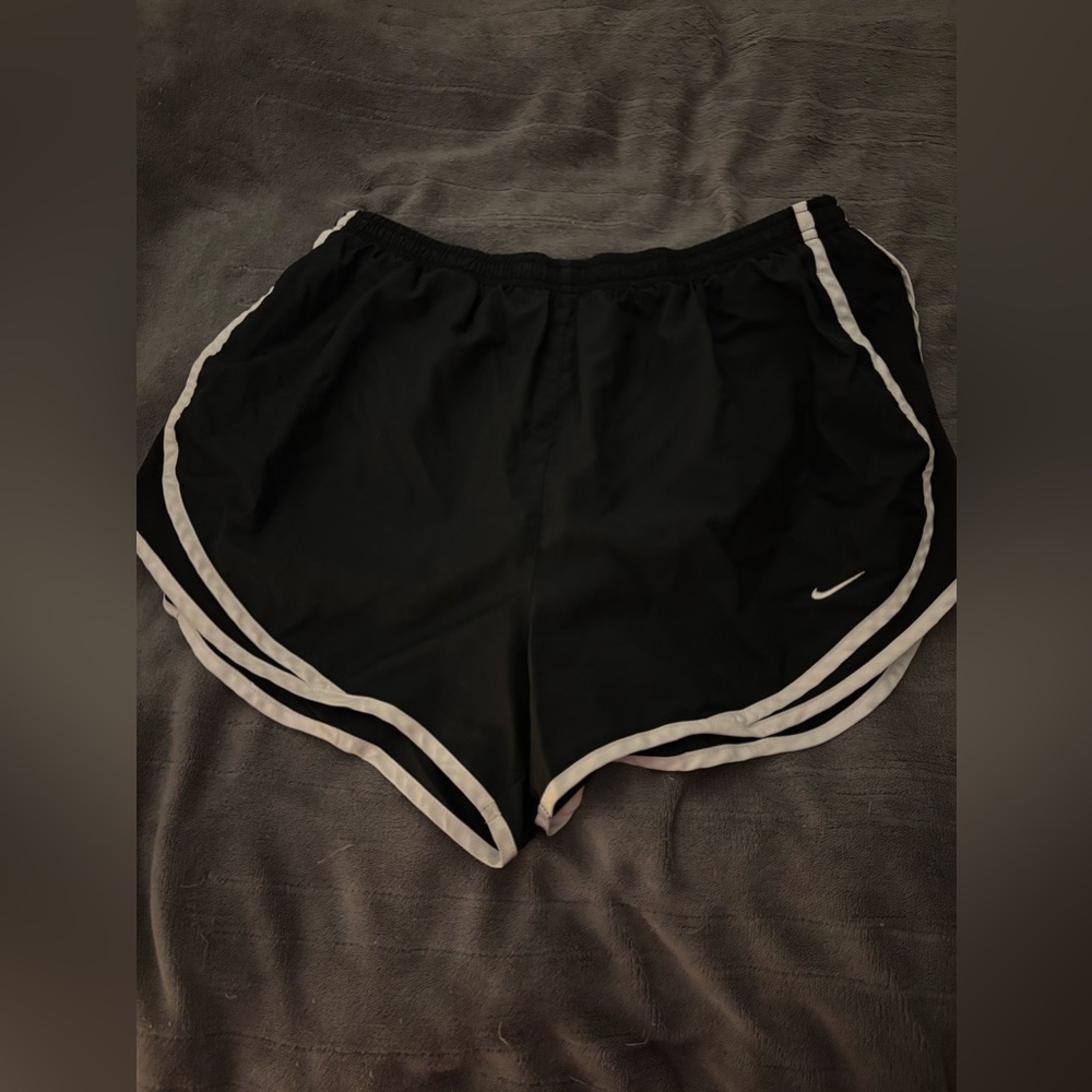 Nike DriFit shorts in black. Size large.